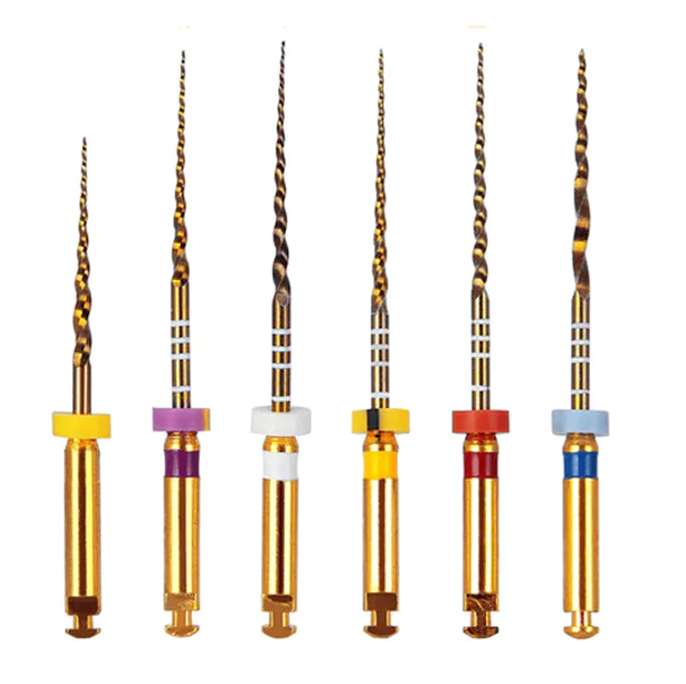 A set of six gold-colored dental root canal files lined up in a row, each with differently colored plastic handles. The slim files, with various lengths and spiral designs, are used for cleaning and shaping dental roots. Buy 🎁 Dental MTaper NiTi File Rotary Engine Files 25mm (Pack of 6) (100% off) by VSDent Get Y on select sets while supplies last! (9497052676406)