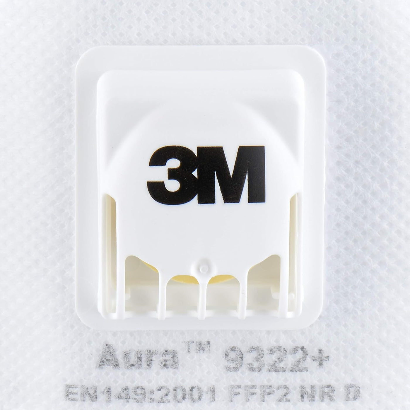 Close-up of a VSDent 3M Mask 9322+ Flat Fold Particulate Respirator valve with the VSDent logo prominently displayed. Below the valve, the mask details "Aura™ 9322+ EM149:2001 FFP2 NR D" are visible on the white mask material, highlighting its low breathing resistance filter and effectiveness as a VSDent protective measure. (9490814566710)