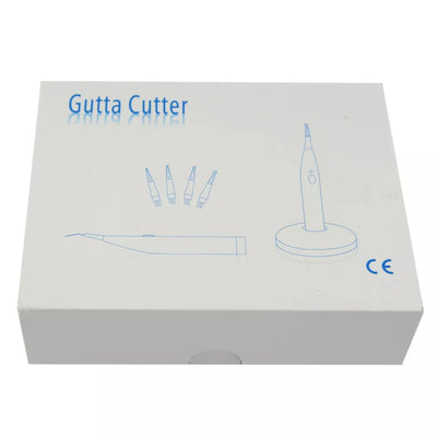 A white box labeled "VSDent C-Blade Cordless Gutta Percha Cutter with 4 Tips" contains illustrations of a dental device and its accessories. The box displays four autoclaveable cutting tips, the main cordless Gutta Percha Cutter, and a charging stand featuring wireless charging technology. The CE mark is visible on the bottom right corner. (4119993319523)