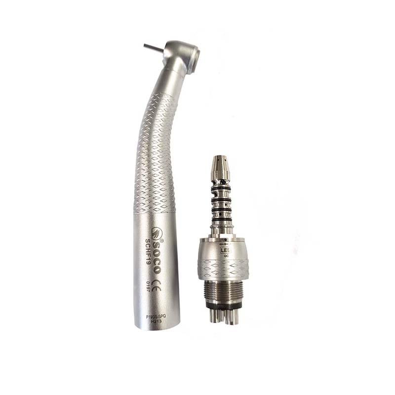 A silver 🎁 Soco LED Fibre Optic Push Button Handpiece 6H Sirona compatible - GS with a textured grip and sleek, curved design is displayed next to a separate cylindrical attachment on a white background. The attachment features ridges and a metallic finish. Buy VSDent, Get VSDent for an amazing deal on this professional setup! (9497053200694)